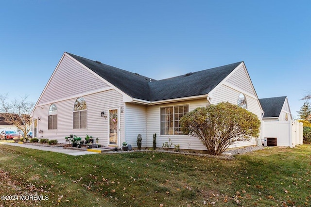 view of front of home with a front yard