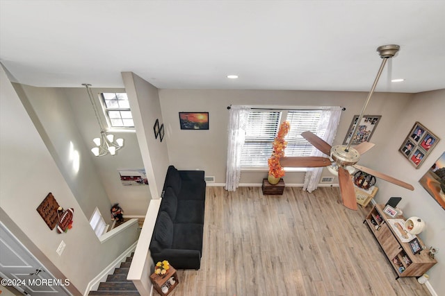 playroom with light hardwood / wood-style floors