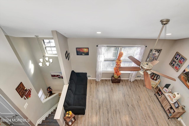 1801 Lilly Ln, Jackson, NJ 08527 - living area with wood finished floors, baseboards, recessed lighting, stairway, and a chandelier