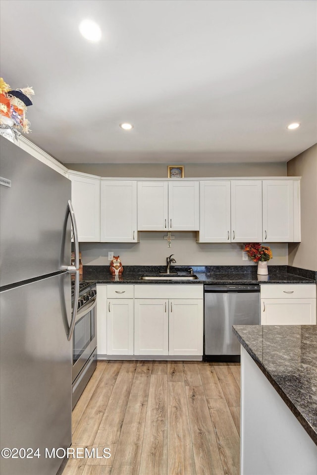 1801 Lilly Ln, Jackson, NJ 08527 - kitchen featuring appliances with stainless steel finishes, a sink, white cabinets, light wood-type flooring, and recessed lighting