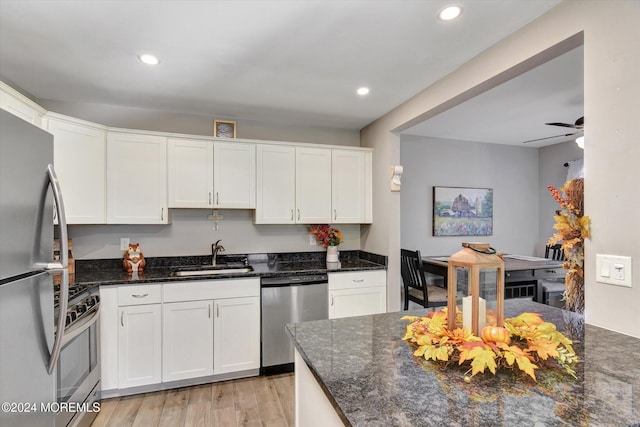 1801 Lilly Ln, Jackson, NJ 08527 - kitchen featuring stainless steel appliances, a sink, light wood-style floors, white cabinetry, and recessed lighting