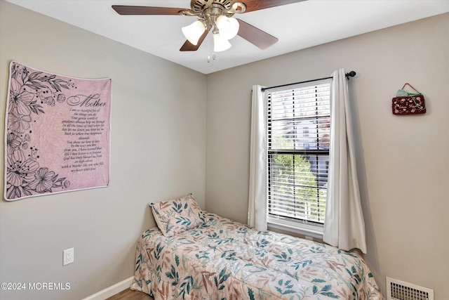 bedroom featuring ceiling fan