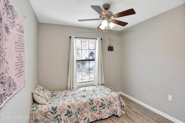 bedroom featuring ceiling fan and light wood-type flooring