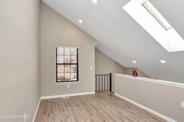 1801 Lilly Ln, Jackson, NJ 08527 - additional living space with a skylight, vaulted ceiling, recessed lighting, wood finished floors, and baseboards
