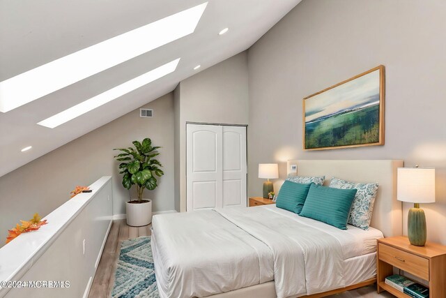 1801 Lilly Ln, Jackson, NJ 08527 - bedroom with a skylight, vaulted ceiling, wood finished floors, a closet, and recessed lighting