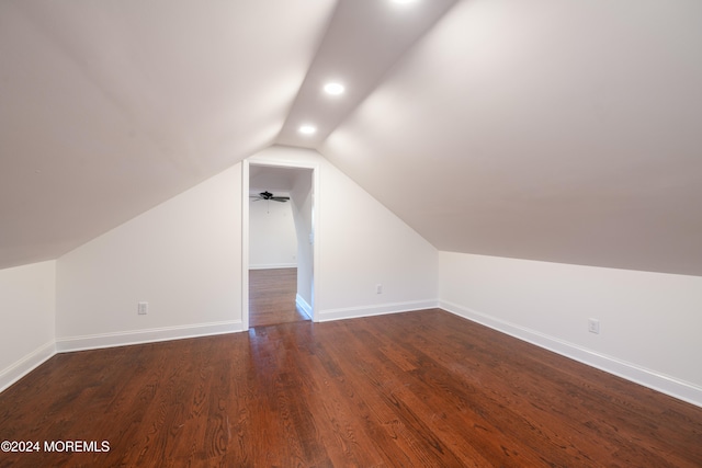 additional living space featuring lofted ceiling, ceiling fan, and dark hardwood / wood-style floors