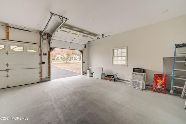 garage with a wall mounted air conditioner