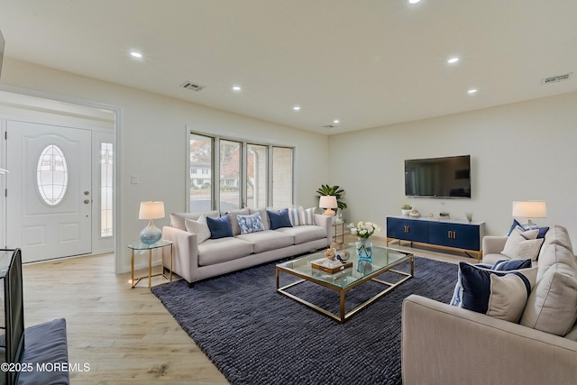 living room featuring light hardwood / wood-style flooring