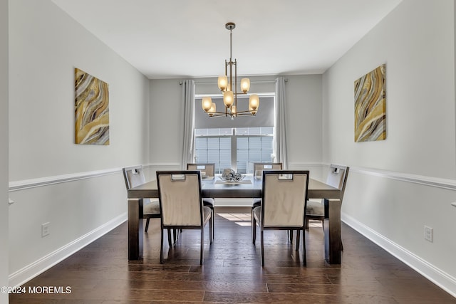 dining area with a chandelier, dark wood-style flooring, and baseboards