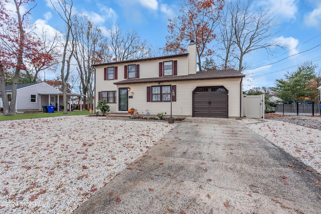 front of property featuring a garage