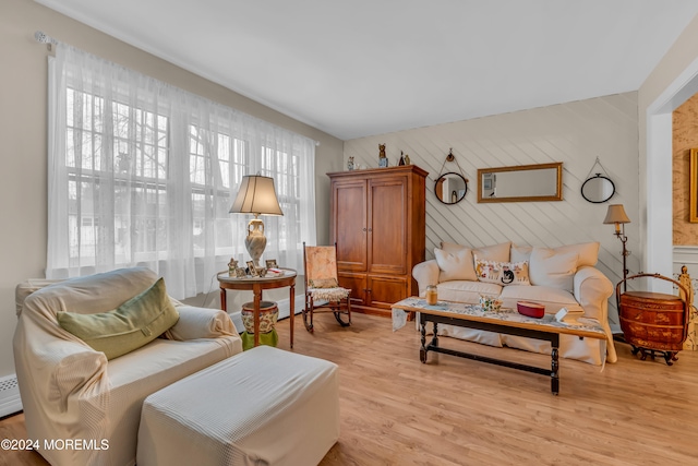 sitting room with light hardwood / wood-style flooring