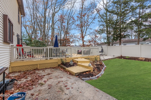 view of yard with a wooden deck