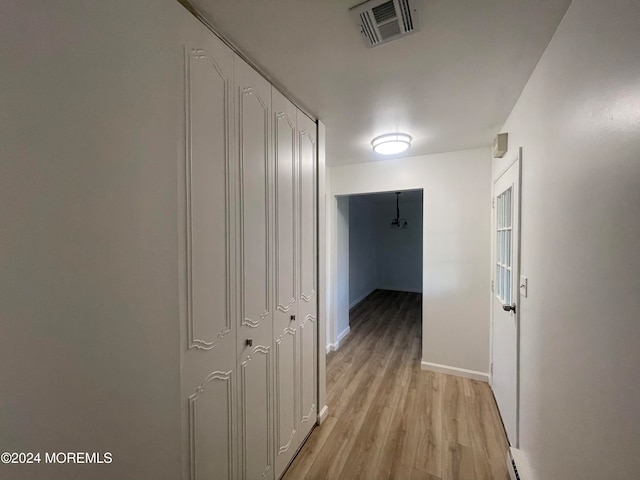 corridor featuring light wood-type flooring