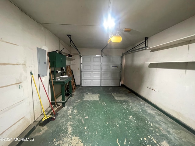 garage featuring a garage door opener and electric panel