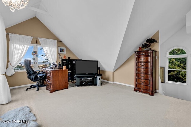 carpeted office featuring an inviting chandelier and plenty of natural light