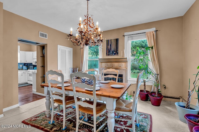 dining space featuring a chandelier