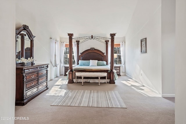 bedroom featuring light colored carpet