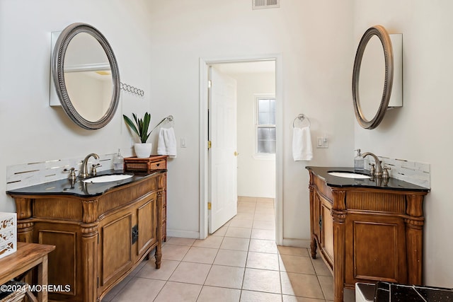 bathroom with vanity and tile patterned floors