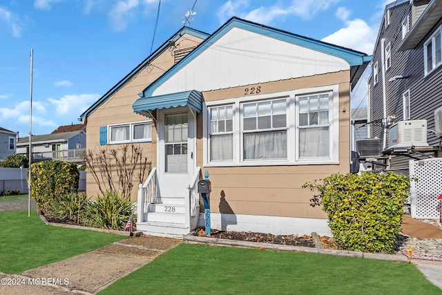 228 Hancock Ave, Seaside Heights, NJ 08751 - view of front of house with entry steps and a front lawn
