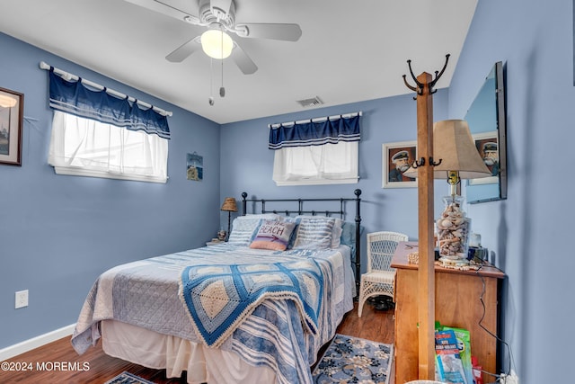 228 Hancock Ave, Seaside Heights, NJ 08751 - bedroom featuring wood finished floors, baseboards, and a ceiling fan