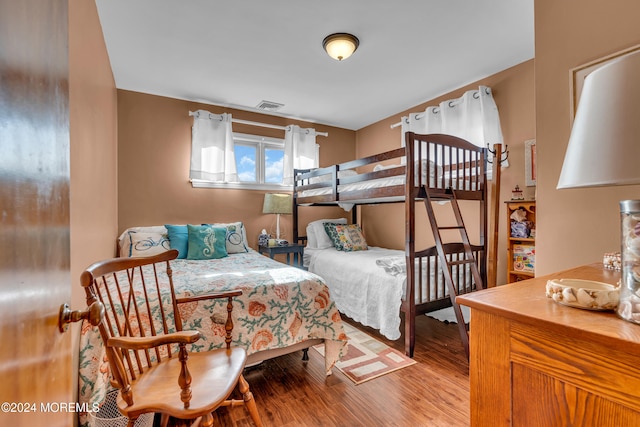 bedroom with light wood-type flooring