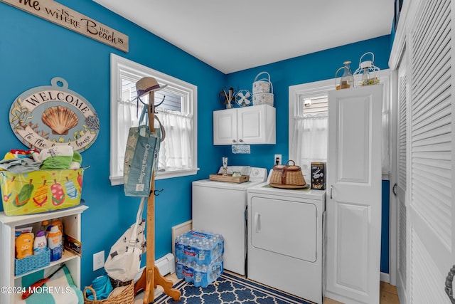 228 Hancock Ave, Seaside Heights, NJ 08751 - washroom with washing machine and clothes dryer, cabinet space, healthy amount of natural light, and baseboards
