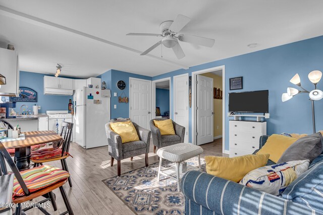 228 Hancock Ave, Seaside Heights, NJ 08751 - living area with a ceiling fan and light wood-style floors