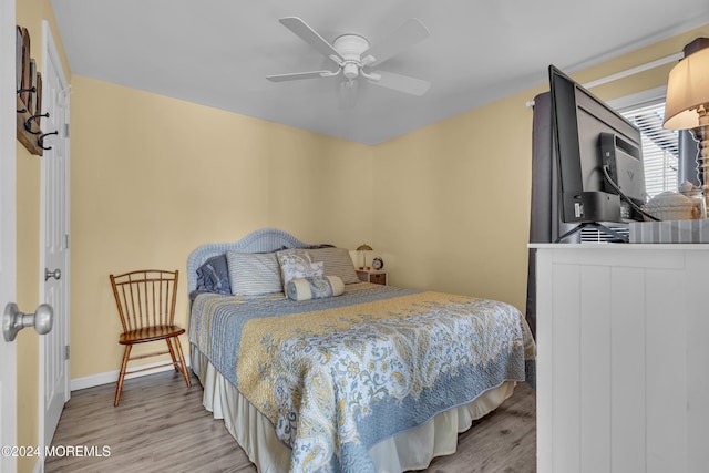 228 Hancock Ave, Seaside Heights, NJ 08751 - bedroom featuring wood finished floors, ceiling fan, and baseboards