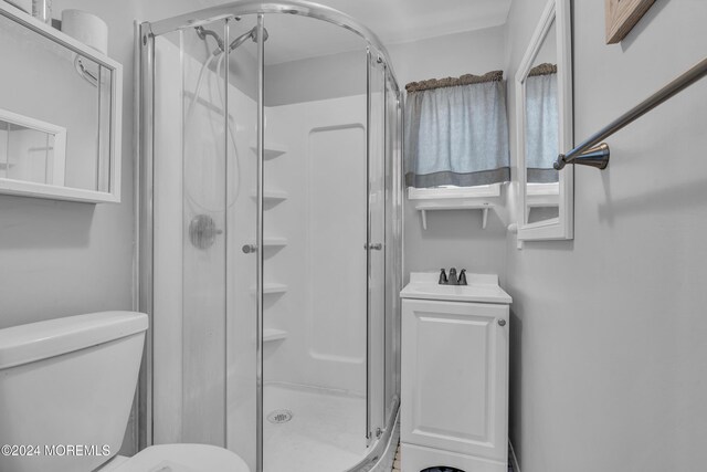 228 Hancock Ave, Seaside Heights, NJ 08751 - full bath with a shower stall, toilet, and a sink