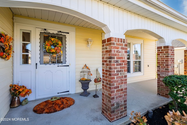 property entrance with a porch