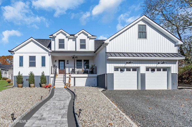 view of front of home with a porch and a garage