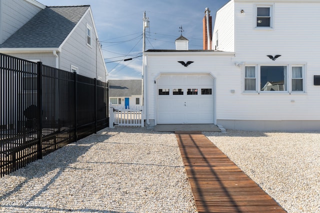 view of home's exterior with a garage