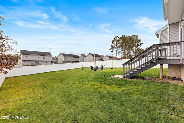 view of yard with a deck