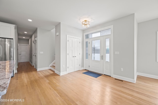 entryway with light wood-type flooring