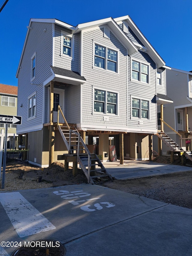 view of front of home featuring a carport