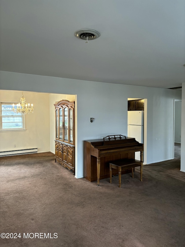 miscellaneous room with dark carpet, baseboard heating, and a notable chandelier