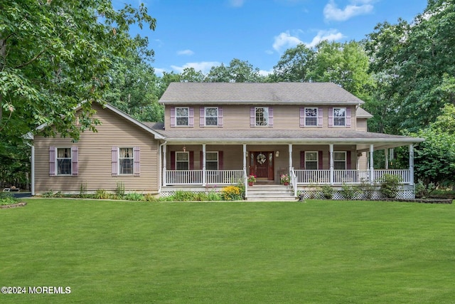 view of front of house featuring a porch and a front lawn