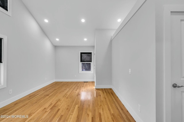 unfurnished room featuring light hardwood / wood-style flooring