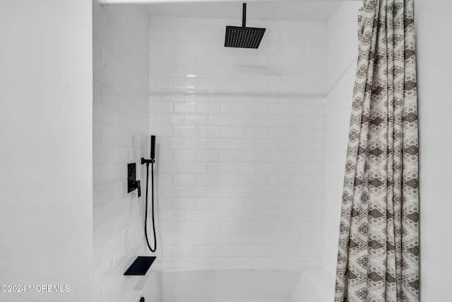 interior details with shower / bath combination with curtain