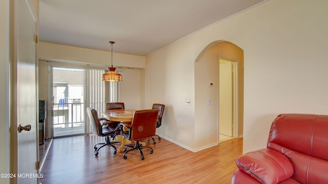 dining room with hardwood / wood-style flooring