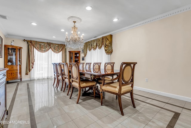 tiled dining space featuring a chandelier and ornamental molding