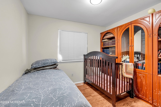 bedroom featuring hardwood / wood-style flooring