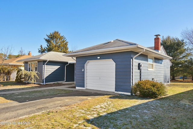 view of property exterior with a garage