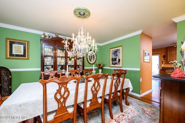 994 Hyson Rd, Jackson, NJ 08527 - dining space with a chandelier, wood finished floors, and ornamental molding