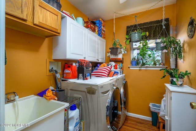 994 Hyson Rd, Jackson, NJ 08527 - washroom with cabinet space, separate washer and dryer, and wood finished floors