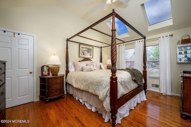 994 Hyson Rd, Jackson, NJ 08527 - bedroom with lofted ceiling, a skylight, wood finished floors, and ceiling fan