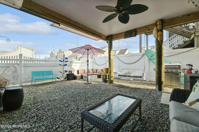 view of yard featuring outdoor lounge area, ceiling fan, and a patio