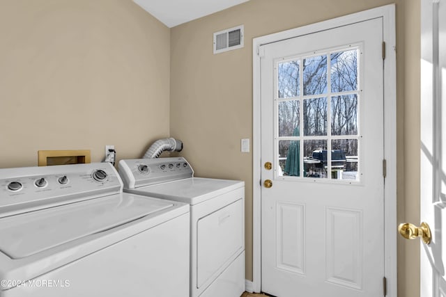 washroom featuring separate washer and dryer