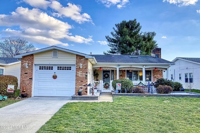 ranch-style house featuring covered porch, a garage, and a front lawn