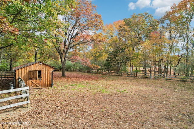 view of yard featuring a storage shed